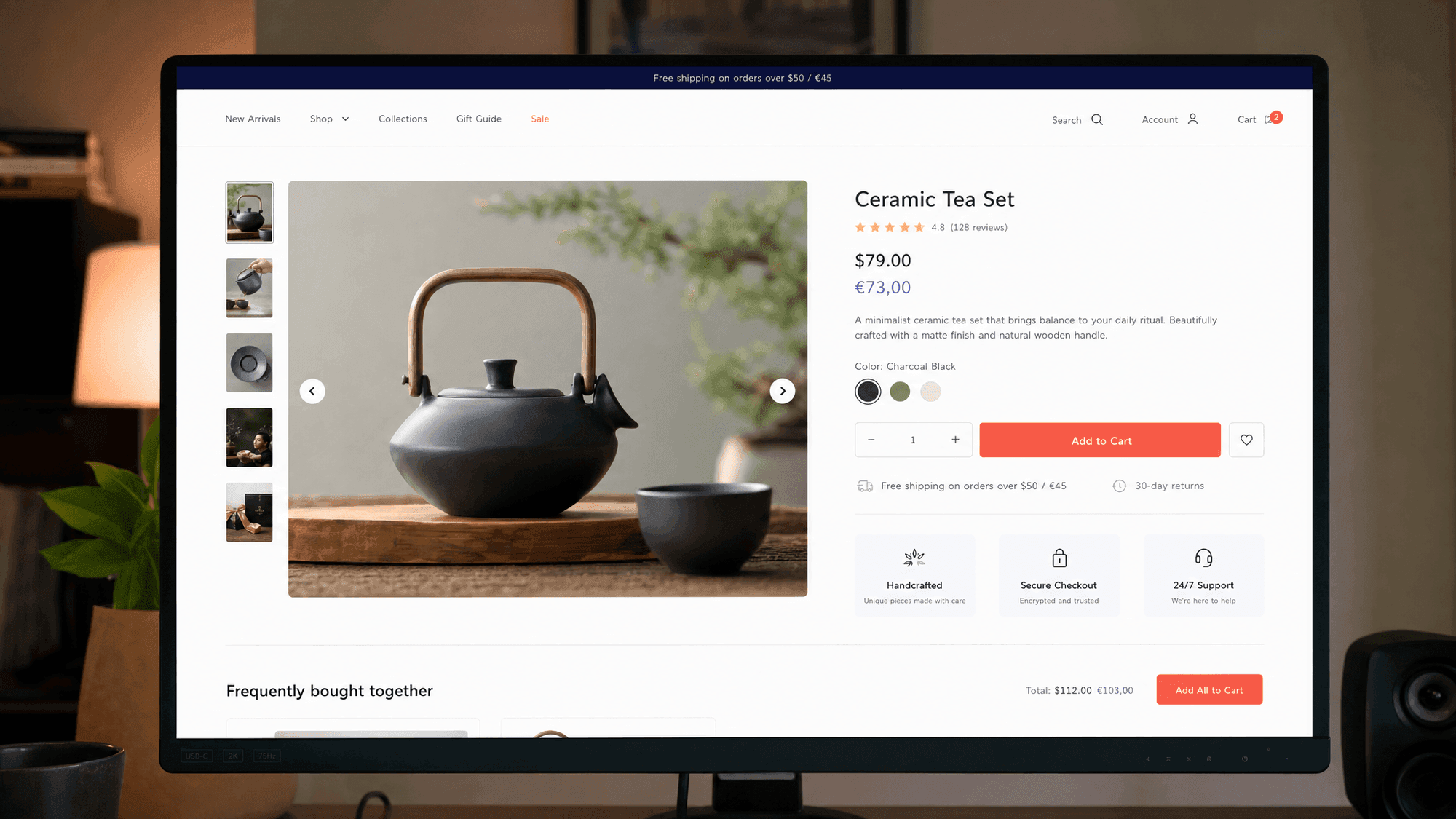 A monitor showing a modern e-commerce product page with a clean product photo, price and add-to-cart button beside a simple checkout